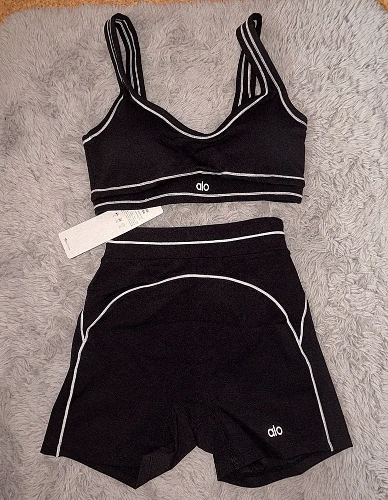 alo yoga Damen Shorts-Set Sport-BH & Shorts Schwarz/Weiß Größe S