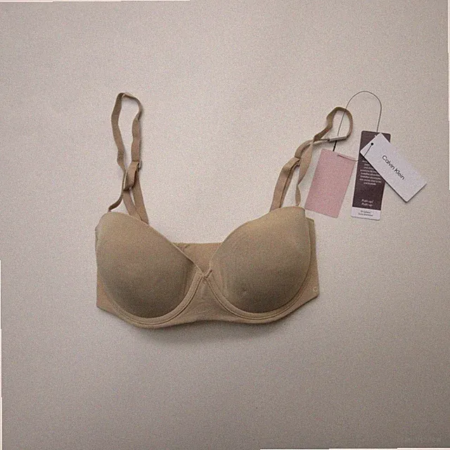 Calvin Klein Damen Push Up Trägerloser BH 30DD Bare Nude Wandelbar Gepolstert