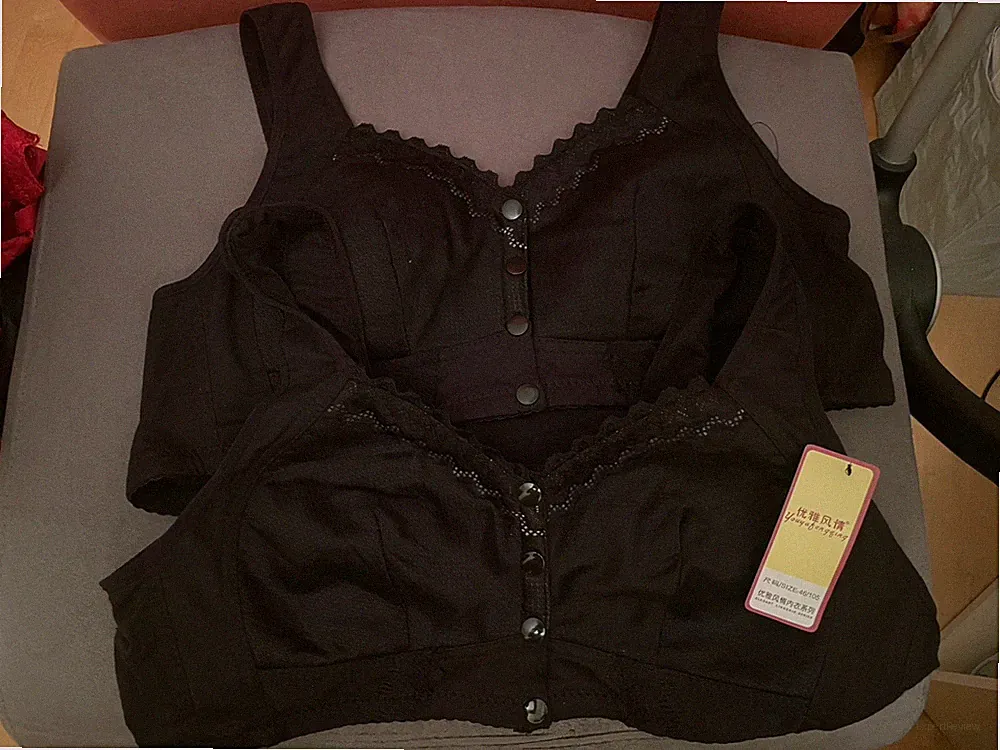Zwei Sport BHs/Bustiere Druckknöpfe vorne Gr. 40/42 schwarz Materialmix NEU